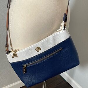 Women’s Anne Klein pebbled texture navy blue and white crossbody bag.